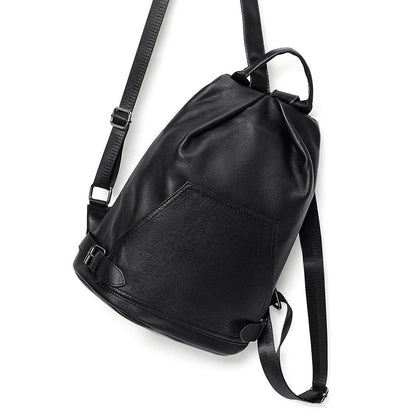 Premium anti-theft leather backpack with cowhide exterior and polyester lining for secure and stylish travel