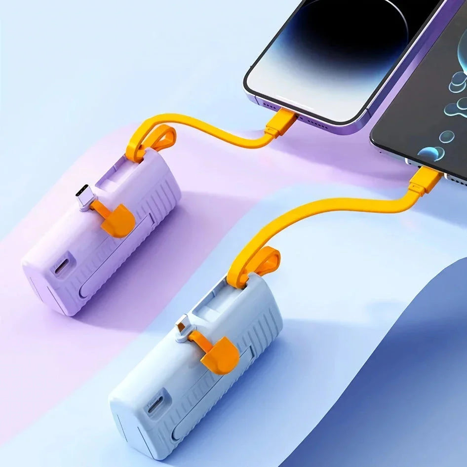 Compact, high-capacity power bank with dual charging ports and built-in cables for convenient, fast charging on the go