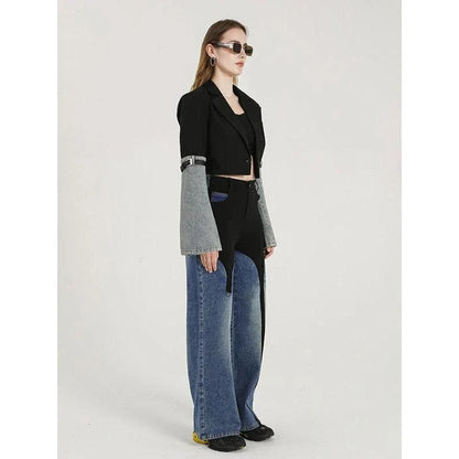 A stylish denim patchwork blazer with a notched collar and single-button closure, designed for the modern British woman