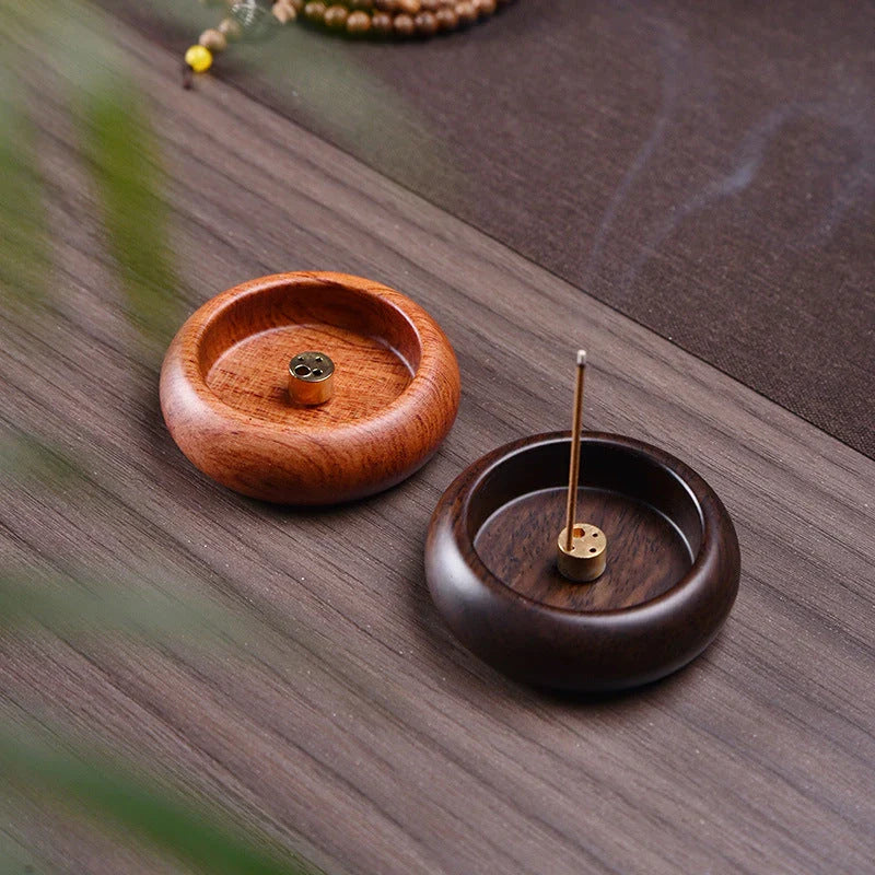 Elegant black sandalwood incense holder with four different caliber sizes to accommodate various incense sticks