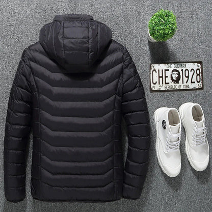 A stylish heated jacket with a removable hood, designed for warmth and comfort in chilly British weather.