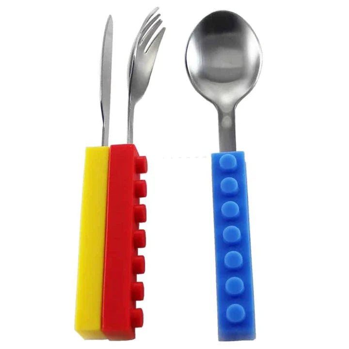 A colourful cutlery set with a decorative brick pattern, made of durable metal and featuring a knife, fork, and spoon.