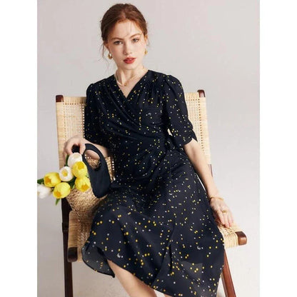 Elegant black polka dot silk wrap dress for women with chic V-neck and empire waistline