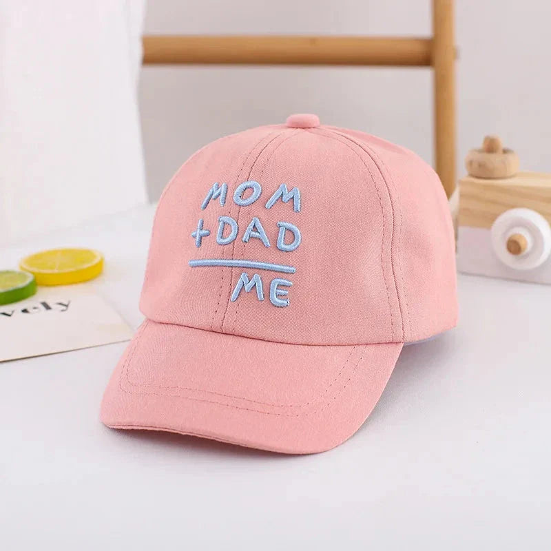 Adjustable cotton sun hat for kids with 'MOM+DAD=ME' embroidery, offering UV protection and breathable comfort