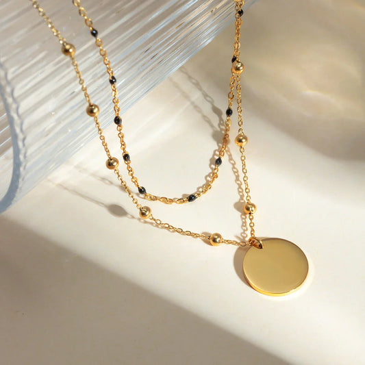 Elegant 18K gold plated black rice bead necklace, a sophisticated accessory for stylish women in the UK