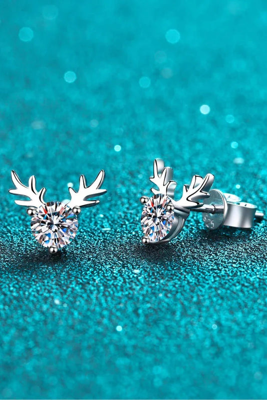 Elegant sterling silver ring featuring a reindeer-shaped moissanite centre stone with a polished finish