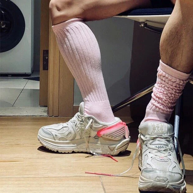 Premium men's breathable terry socks in various solid colours, offering superior moisture-wicking and comfort