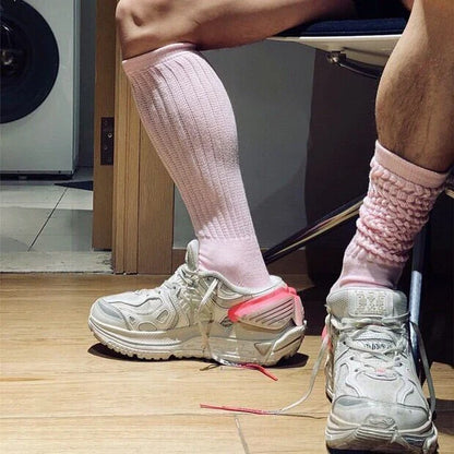 Premium men's breathable terry socks in various solid colours, offering superior moisture-wicking and comfort