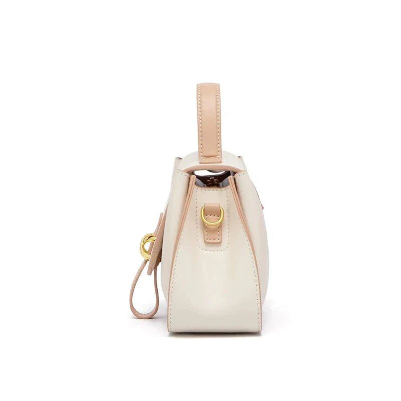 Luxury leather shoulder bag for women, featuring a sleek design, spacious interior, and premium split leather construction.