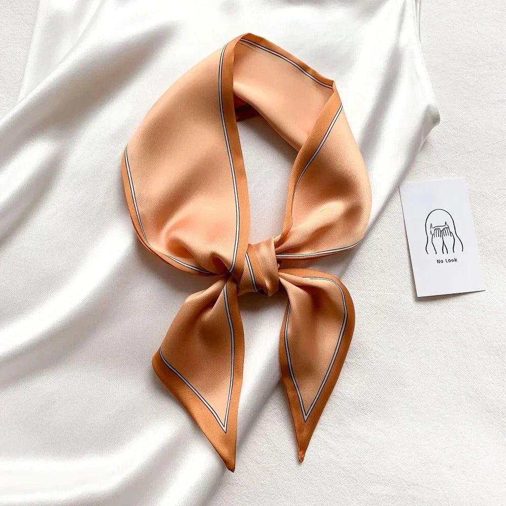 Luxury silk-feel narrow scarf in blue colour, a versatile fashion accessory for the modern British woman