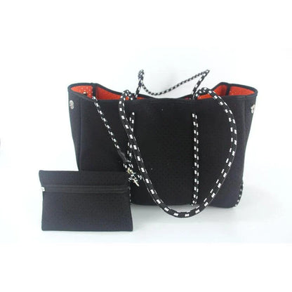 A neoprene beach bag in a stylish design, perfect for British summer adventures at the coast