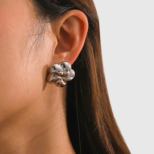 Elegant 18K gold plated flower-shaped stud earrings made from durable stainless steel