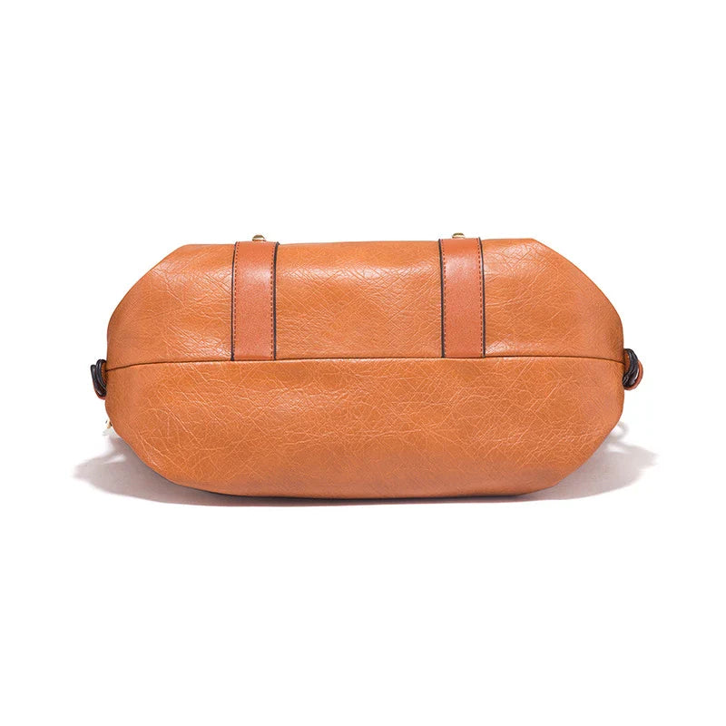 Premium leather shoulder bag in various colours, featuring a spacious yet sleek design for the modern British woman