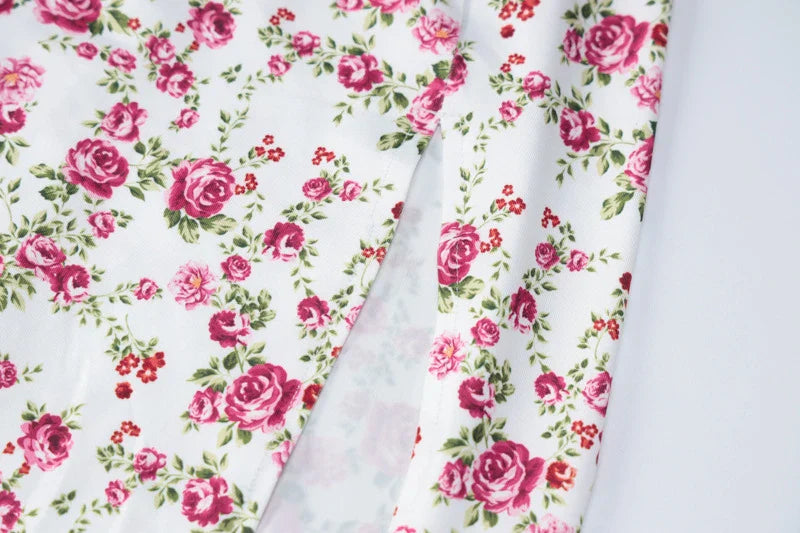Elegant floral print maxi dress in various colours, perfect for British summer events and occasions