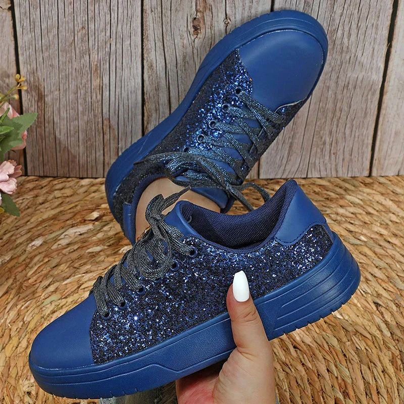 Glittering sequin flats with thick soles and lace-up closure in various vibrant colours