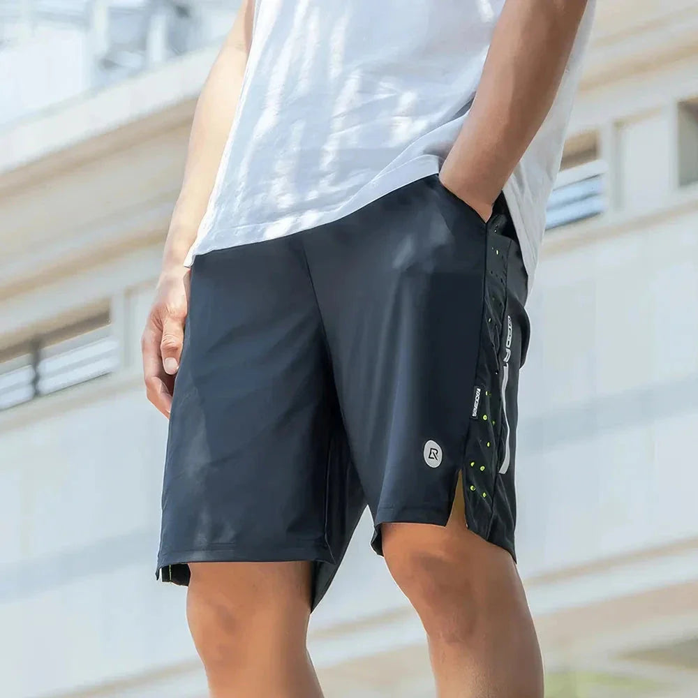 Premium performance sports shorts in dark blue colour, featuring reflective details for enhanced visibility during workouts