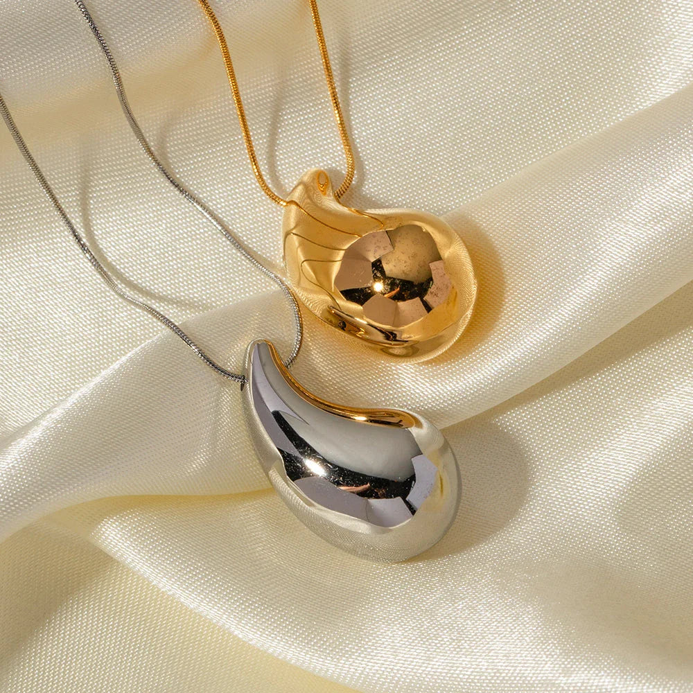 Elegant gold-plated stainless steel necklace with a large, sparkling waterdrop-shaped pendant