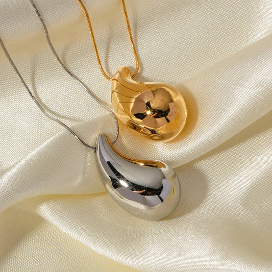 Elegant gold-plated stainless steel necklace with a large, sparkling waterdrop-shaped pendant