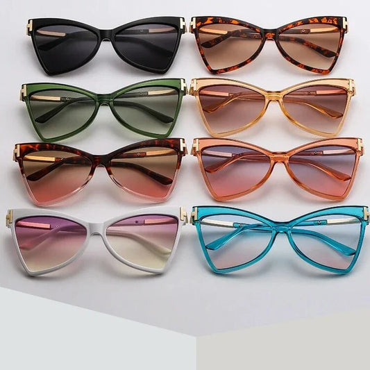 Vintage-inspired cat-eye sunglasses with vibrant colour lenses and 100% UV protection