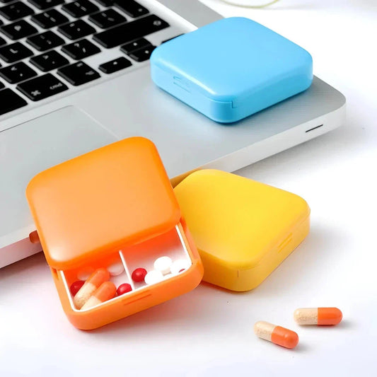 Compact and portable 2-grid mini pill box made of durable ABS plastic for organised medication storage