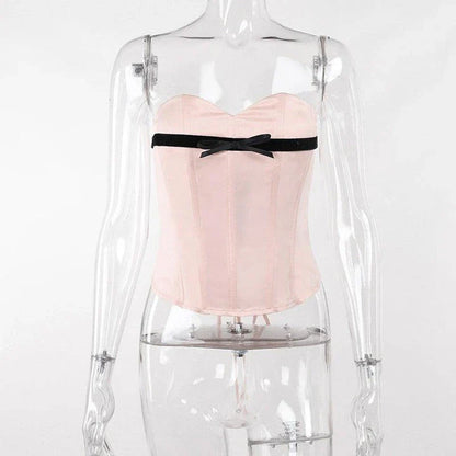 Stylish bow-accented waist back fashion in pink, made with premium polyester for a comfortable and flattering fit.