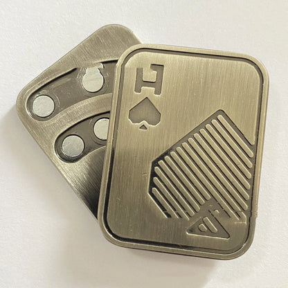 Premium British-made fingertip peg-top decompression toy in silver, copper, and skull designs