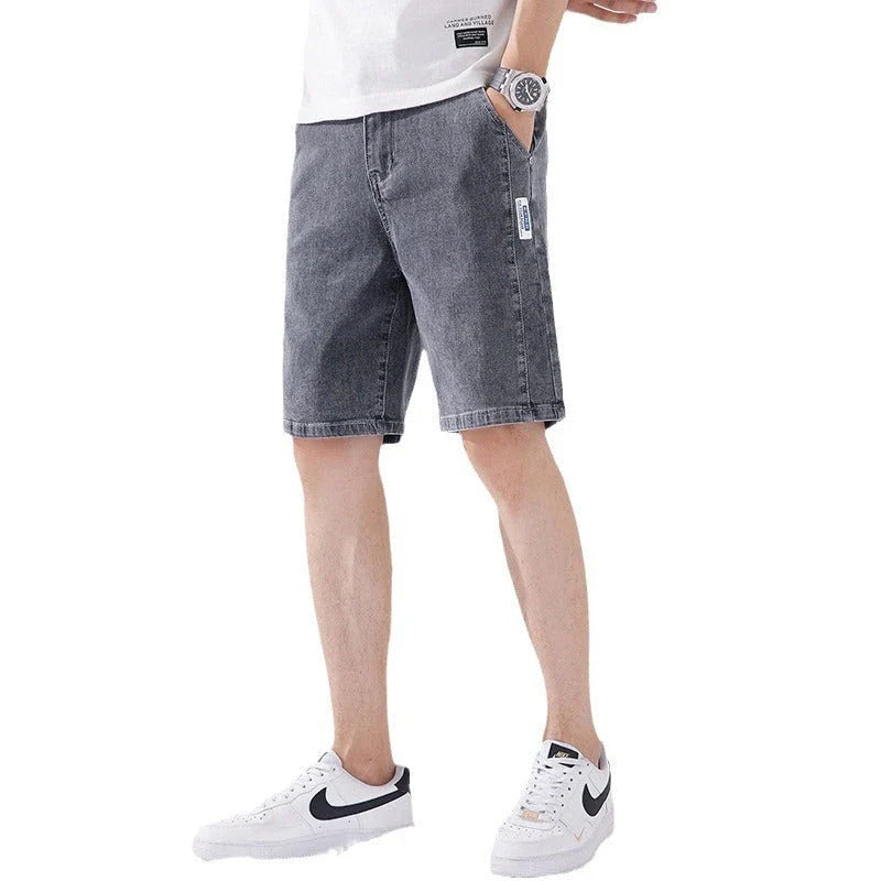 Premium straight-leg capri trousers in black, grey, blue grey, and light blue colours, featuring an elastic waistband and a durable, wrinkle-resistant fabric blend.