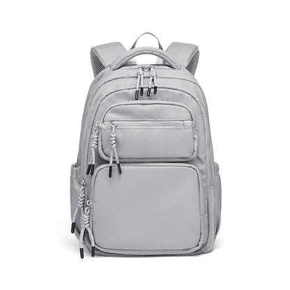 Premium leather backpack with dedicated laptop compartment, soft handles, and arcuate shoulder straps for modern women