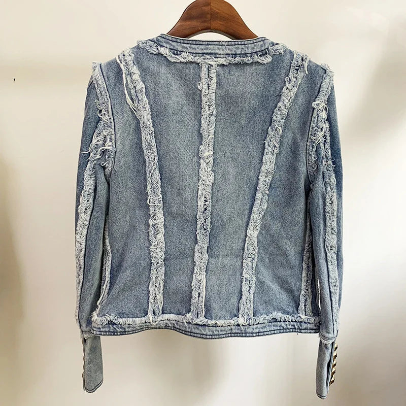 Trendha denim jacket with fringe stitching, lion head buckle, and slim-fit silhouette