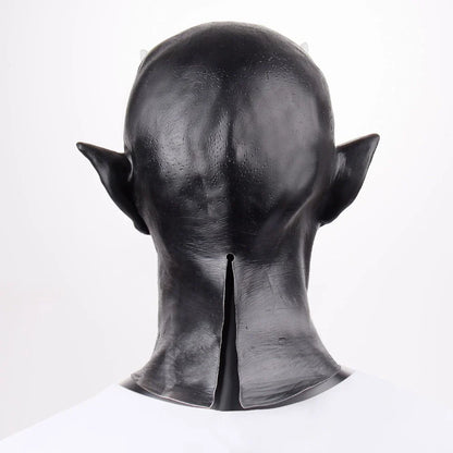 A close-up view of a black latex mask with twisted, menacing horns, creating a fearsome demonic appearance for Halloween costumes and parties.