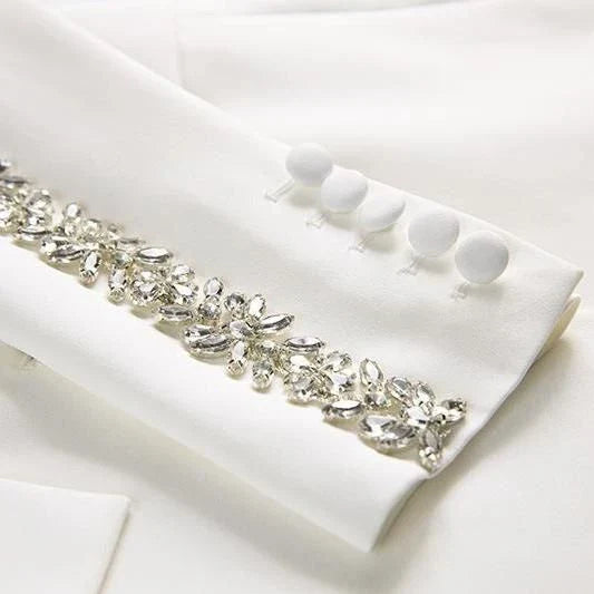 Elegant British designer women's suit set with beaded blazer and flare pants in white