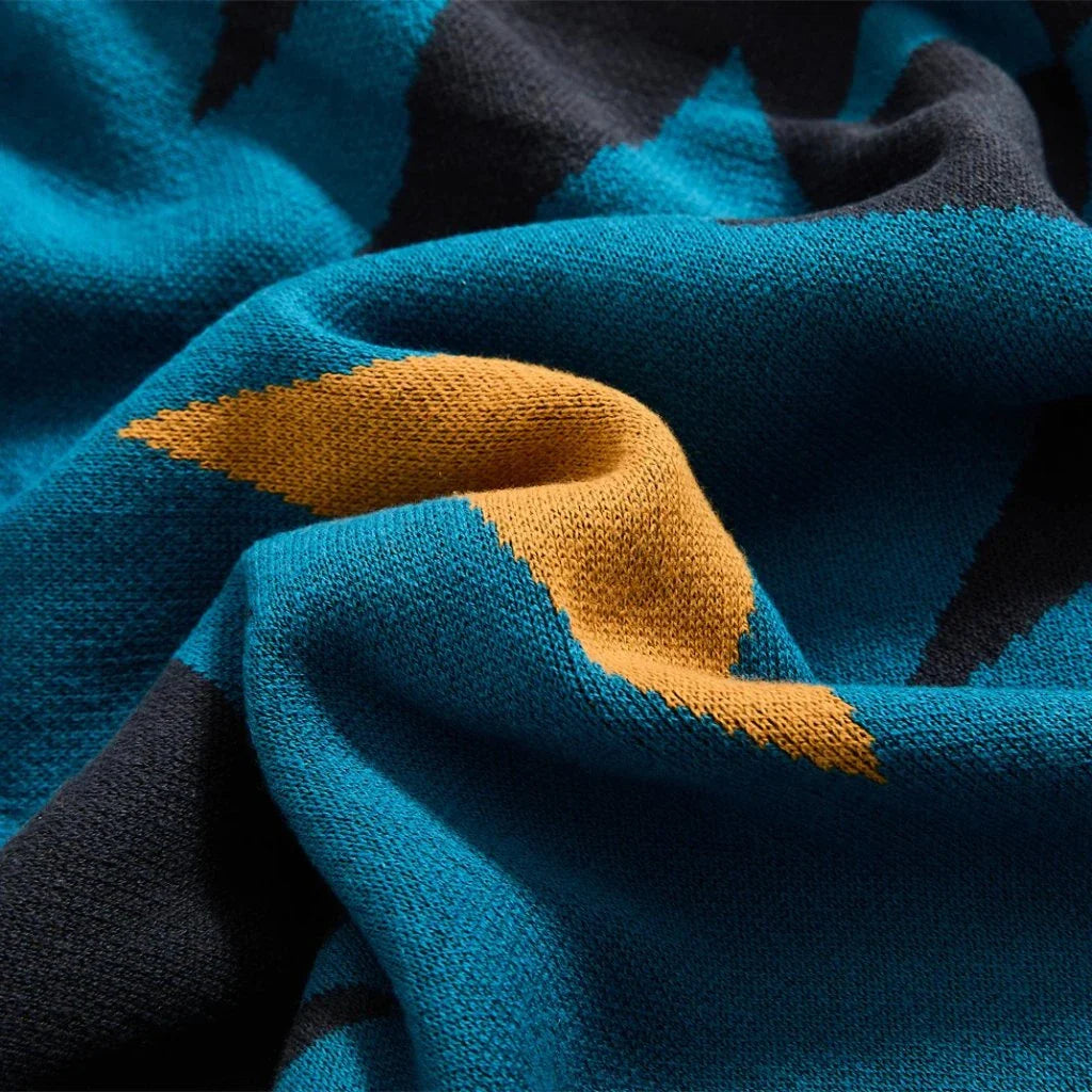 Elegant Bohemian Geometric Pattern Blanket made from premium cotton with luxurious fringes, available in various colours