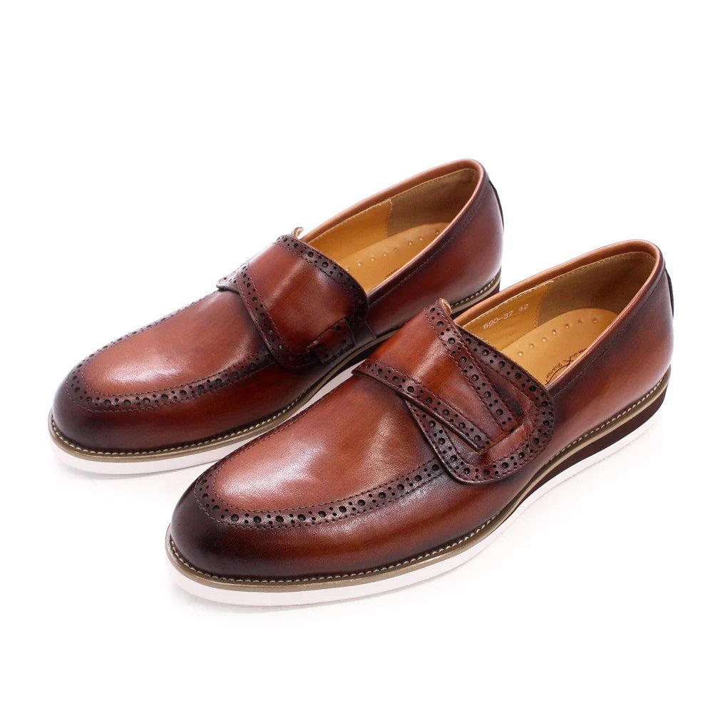 Premium handcrafted British leather casual loafers for men, featuring a round toe, flat heel, and durable rubber sole
