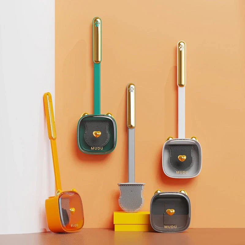 Stylish cat-themed wall-mounted toilet brush set in various colours, including green, orange, white, and grey