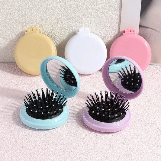 Compact folding hair comb with mirror, perfect for on-the-go touch-ups and styling for British customers