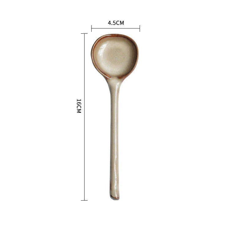 Elegant ceramic soup spoon with long handle and vibrant grey glaze, perfect for refined dining experiences