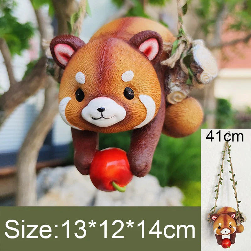 Charming resin raccoon statue climbing a decorative rope, adding a whimsical and nature-inspired touch to your outdoor or indoor spaces