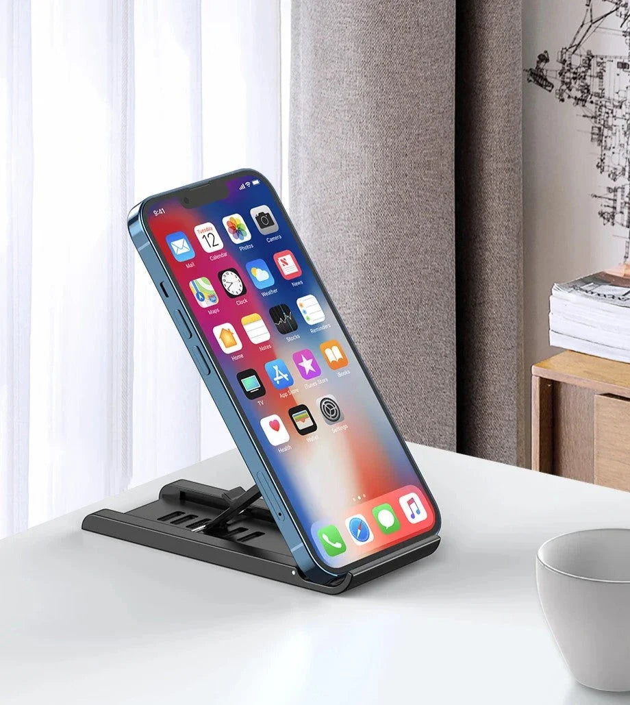 Premium aluminium alloy and plastic desk phone holder stand in green, elevating a mobile device for comfortable hands-free use