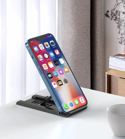 Premium aluminium alloy and plastic desk phone holder stand in green, elevating a mobile device for comfortable hands-free use