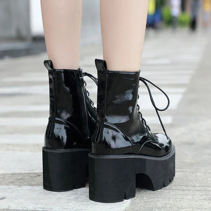 Premium lace-up high heel ankle boots in black, featuring a secure closure, supportive heel, and sleek, sophisticated silhouette.