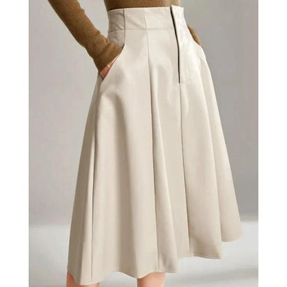 High-waist, A-line black PU leather skirt with a knee-length design for a sophisticated, elegant look