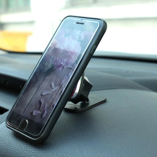Compact magnetic phone mount with adjustable ball joint for secure in-car use
