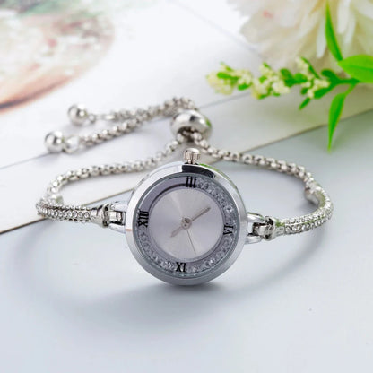 Elegant stainless steel quartz women's watch with compact dial, designed for timeless style and functionality