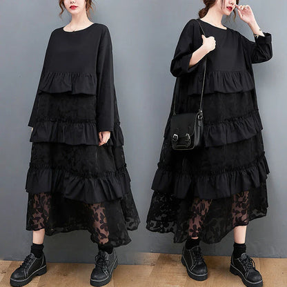 Stylish plus size dress in sophisticated black mesh fabric with wide waistline and long sleeves