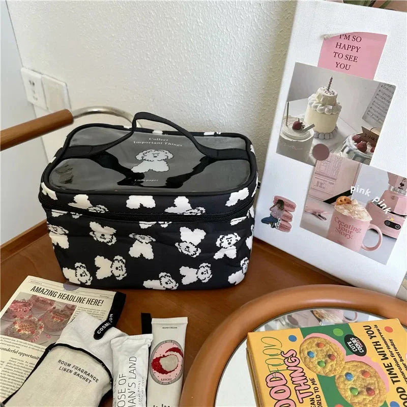 Charming dog print makeup bag with large capacity and secure zipper closure for organised storage of beauty essentials
