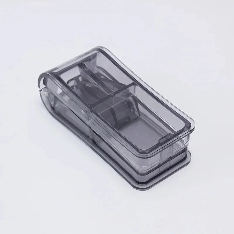 Compact Pill Splitter and Storage Organizer with Orange Colour, Featuring Precision Cutting Blade and Built-in Storage Compartment