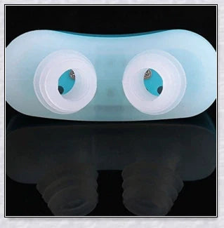 Maskless, cordless anti-snoring device for sleep apnea relief, featuring innovative air filtration system and compact, discreet design