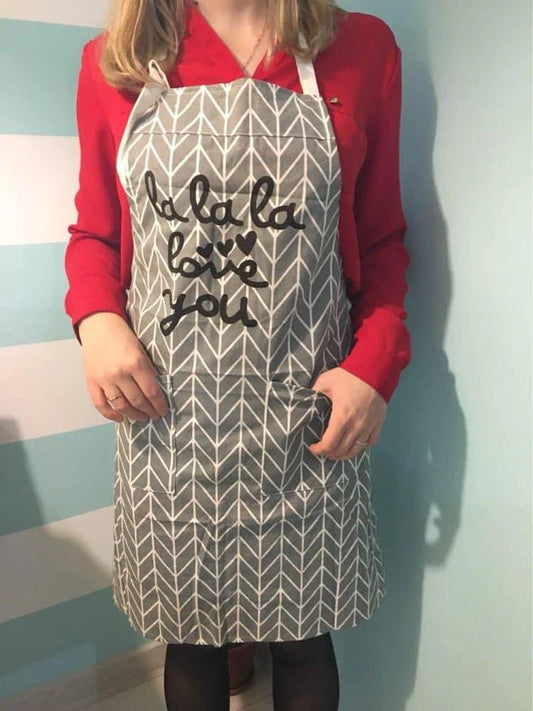 Premium cotton printed kitchen apron with floral design, offering full coverage and adjustable fit for the discerning UK homemaker