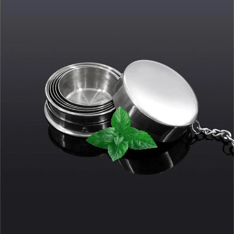 Compact Stainless Steel Folding Cup in three different sizes, perfect for outdoor activities like camping, hiking, and picnics.