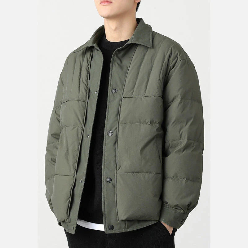 A premium lightweight down jacket in a sleek, tailored design for the stylish British gentleman